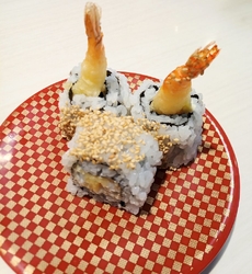 お寿司を食べに...