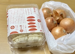 新聞の折り込み...