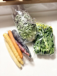 お野菜購入で立...