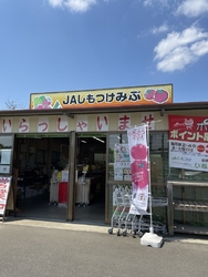 通りすがりに立...