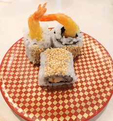 お寿司を食べに...