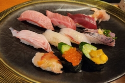 今日はお寿司の...